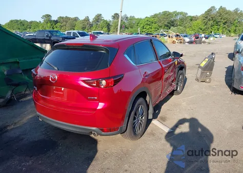 2021 Mazda Cx-5 Sport z USA, uszkodzony, nr VIN JM3KFBBM5M1300255